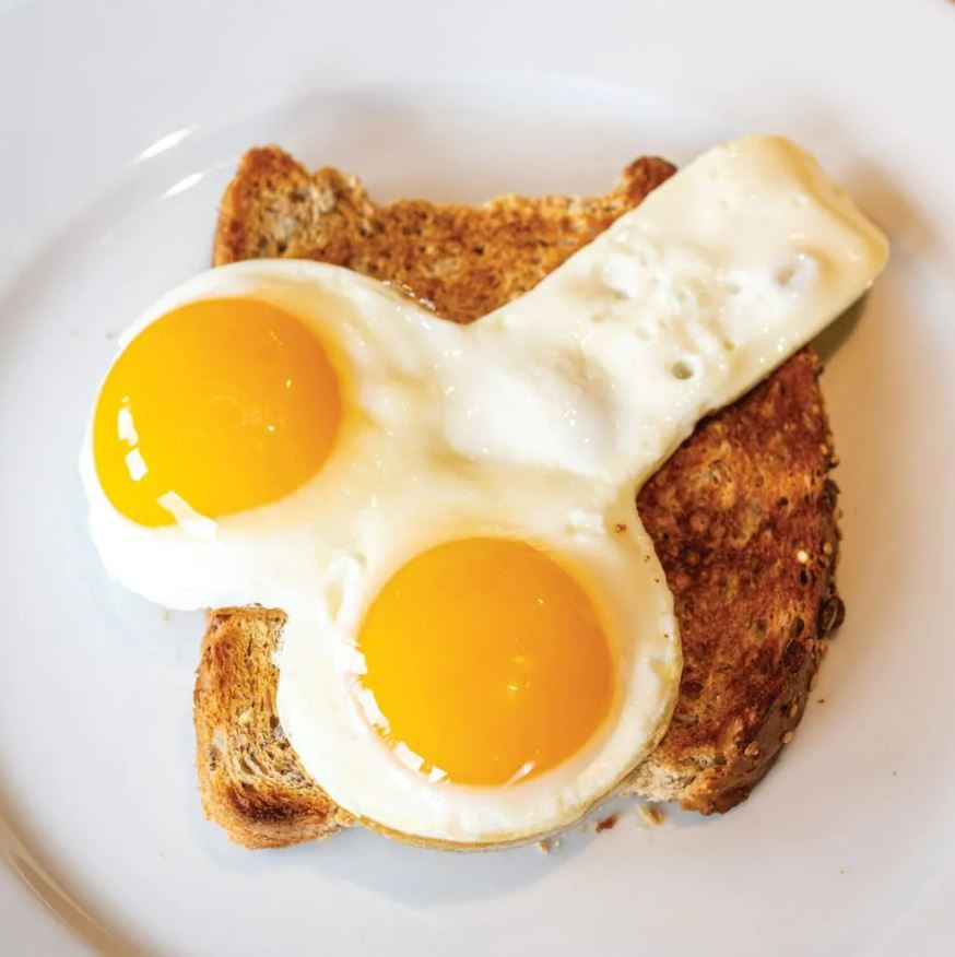 Two fried eggs on toast.