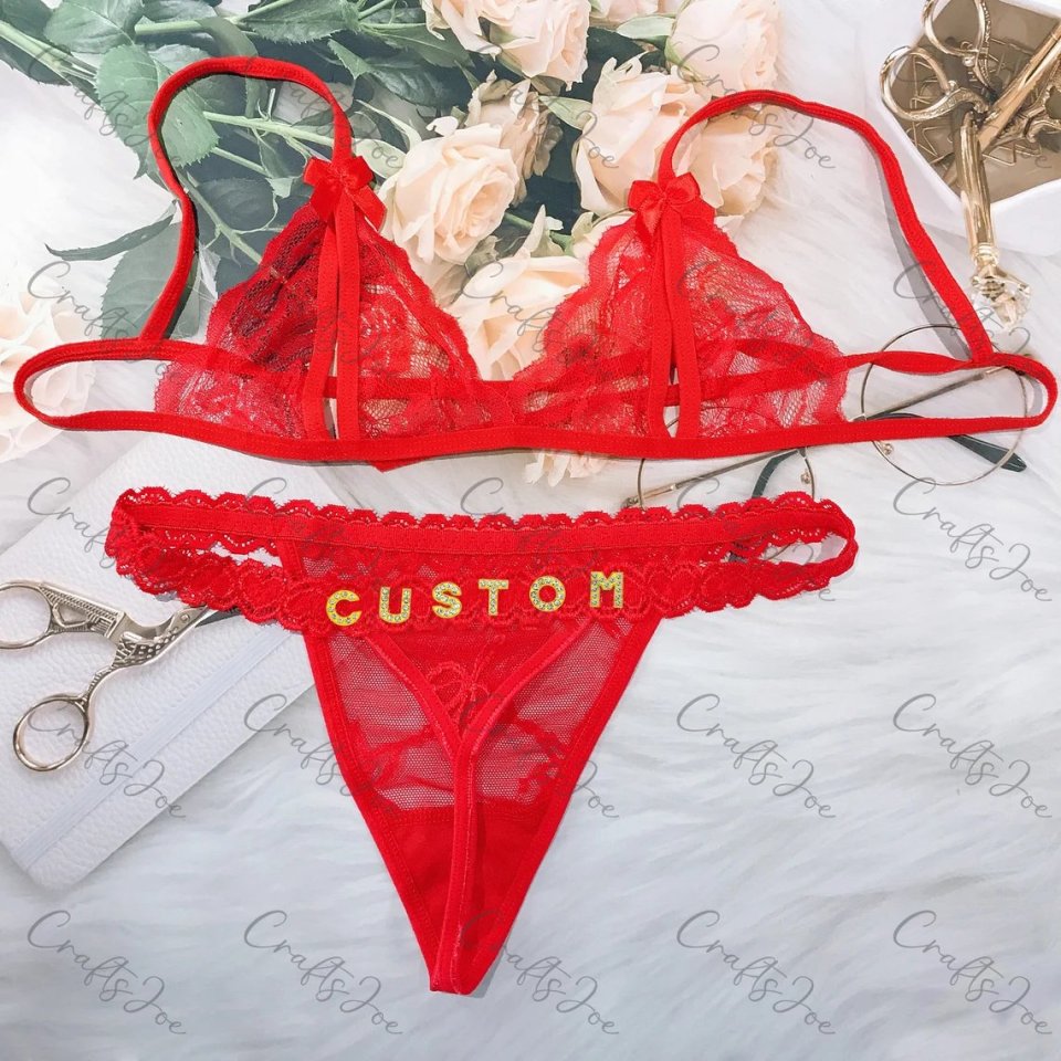 Red lace lingerie set with "CUSTOM" spelled out in gold rhinestones.