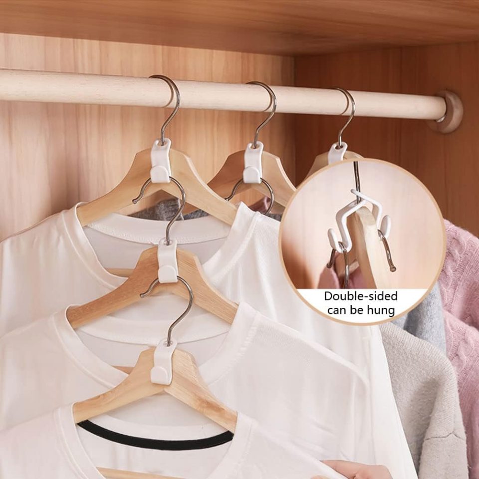 Clothes hanging on a closet rod using space-saving hangers.