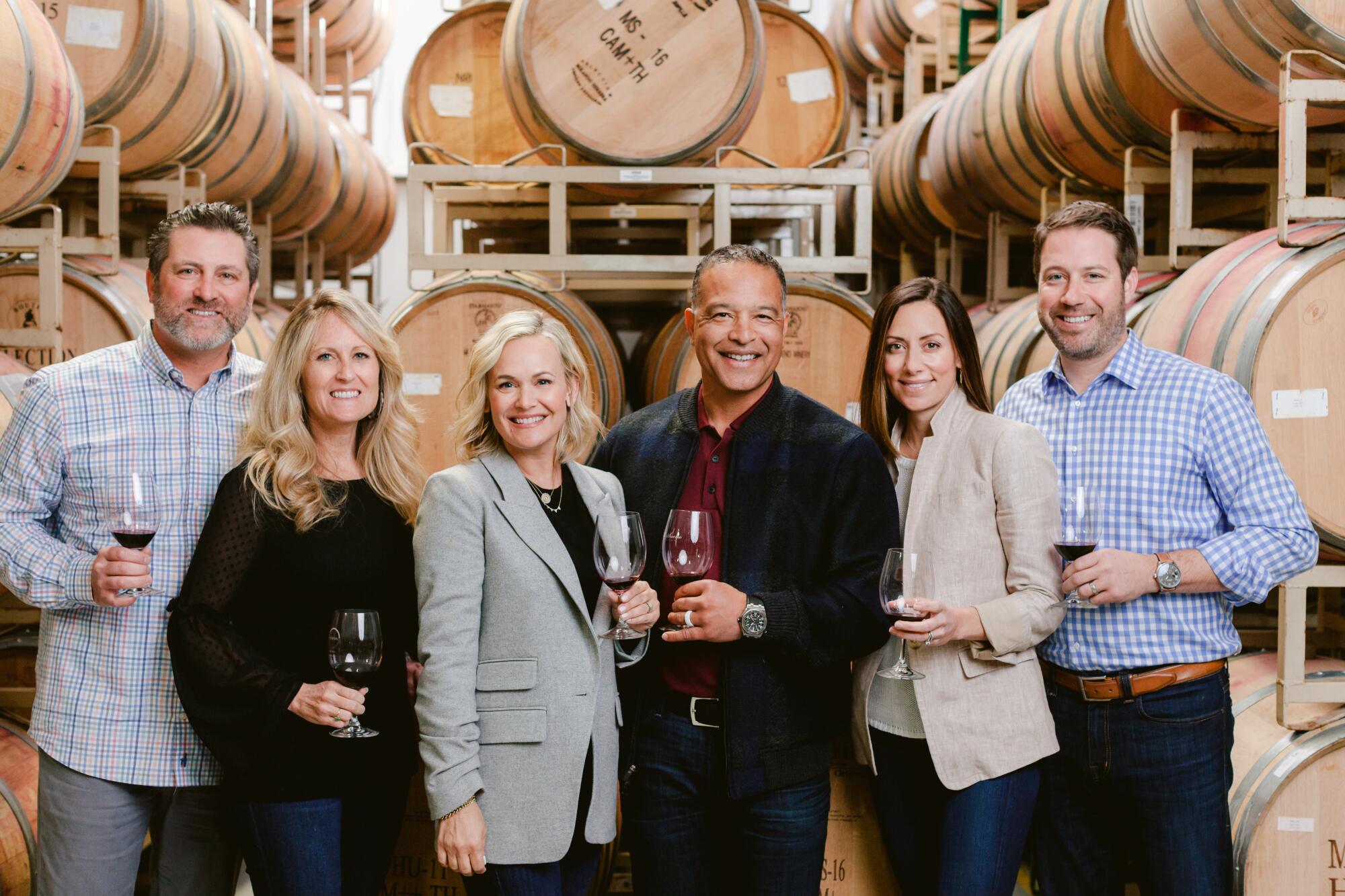 Red Stitch Wines owners (from left) Rich and Amy Aurilia, Tricia and Dave Roberts, and Noelle and John Micek.