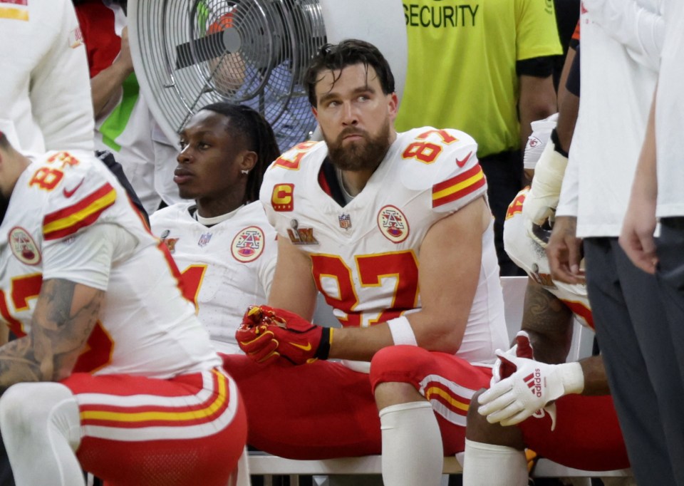 Travis Kelce of the Kansas City Chiefs on the bench during a game.