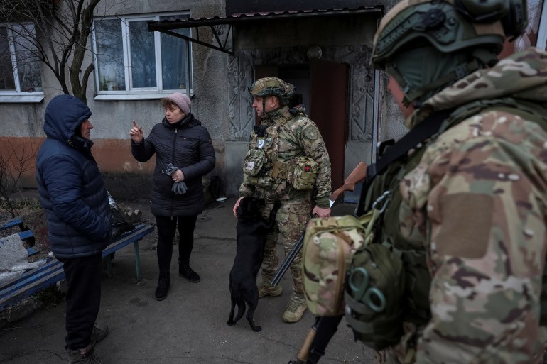 Members of the White Angel unit of Ukrainian police officers who evacuates people from the frontline towns and villages, try to persuade residents to evacuate, amid Russia's attack on Ukraine, in the frontline town of Pokrovsk in Donetsk region, Ukraine February 6, 2025. REUTERS/Anatolii Stepanov