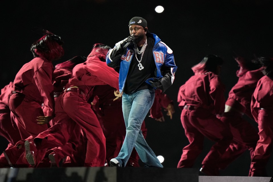 Kendrick Lamar performing at the Super Bowl halftime show.