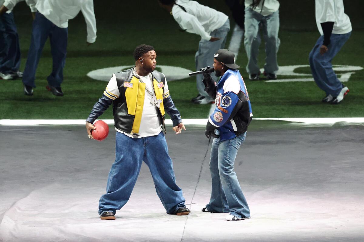 Mustard, left, and Kendrick Lamar perform.