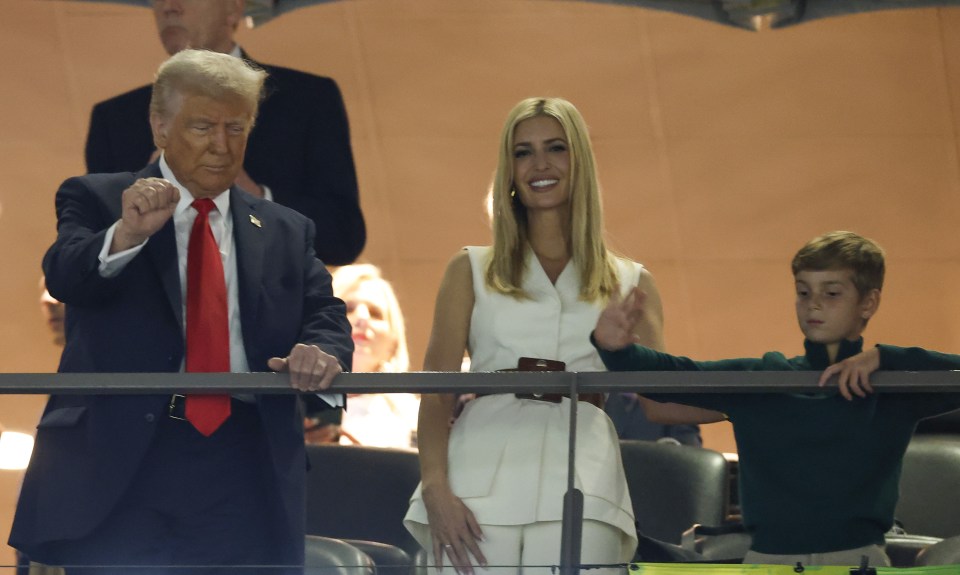 Donald Trump, Ivanka Trump, and a child at the Super Bowl.