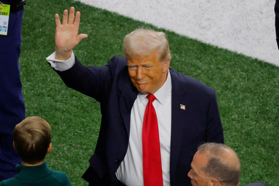 Donald Trump waving.