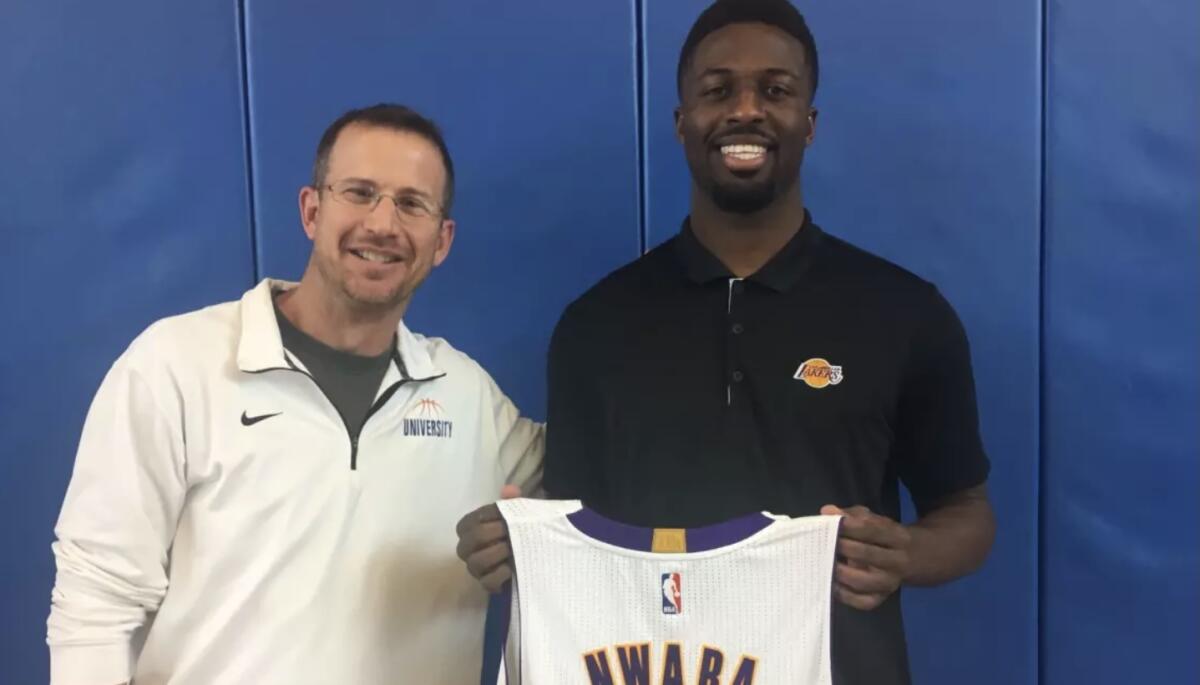 Former University High standout David Nwaba, in 2017, with coach Steve Ackerman.