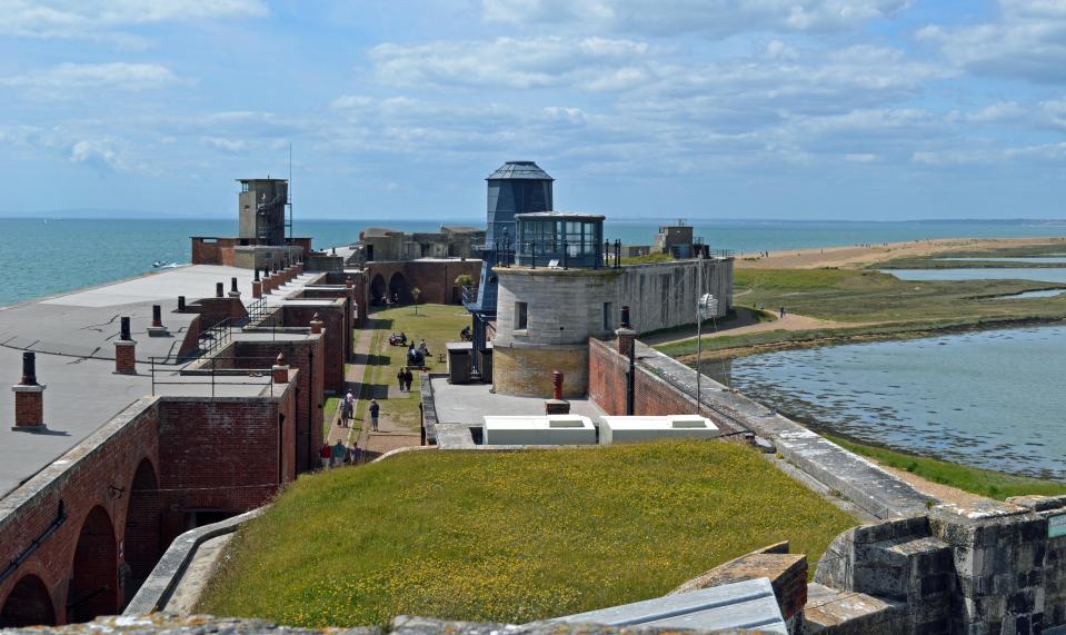 View of Hurst Castle from its ramparts, overlooking the sea and surrounding landscape.