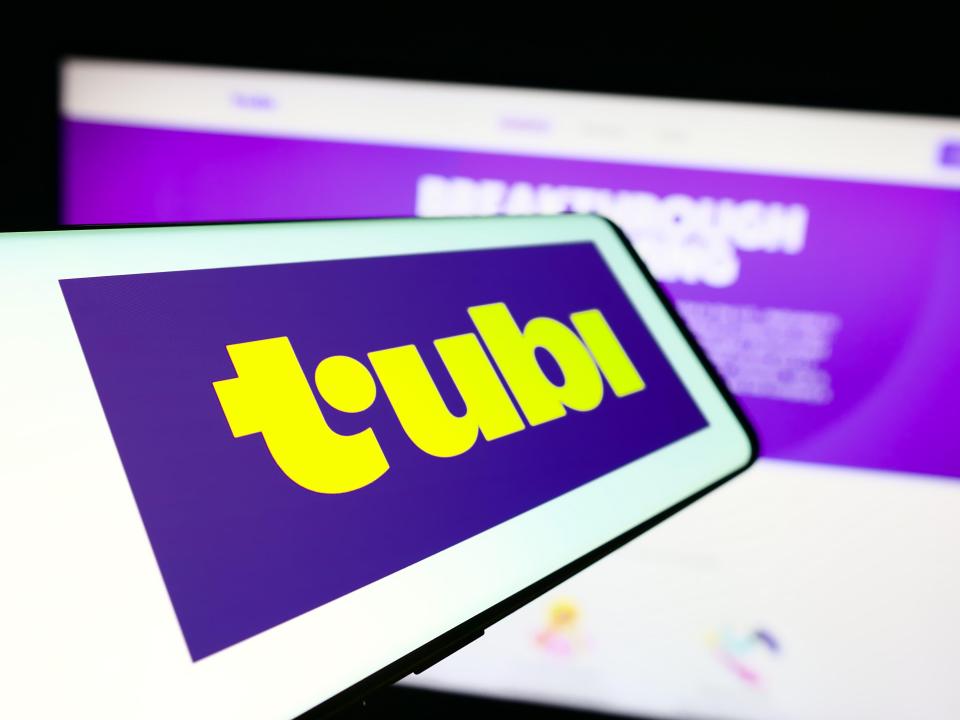 Tubi logo on a cellphone screen.