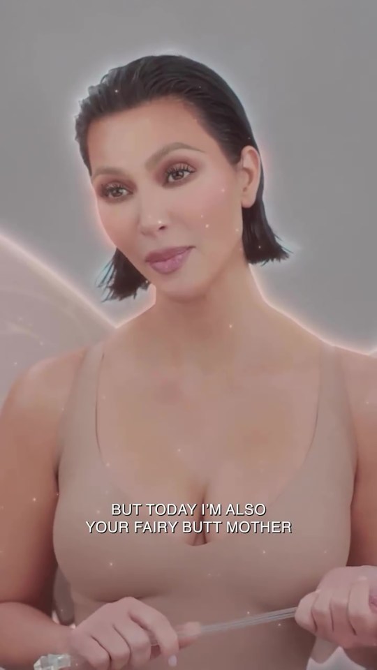 Kim Kardashian in a beige top, stating, "But today I'm also your fairy butt mother."