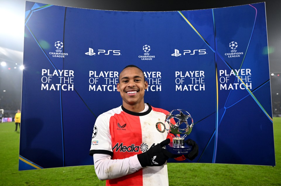 Igor Paixao of Feyenoord holding the Playstation Player of the Match award.