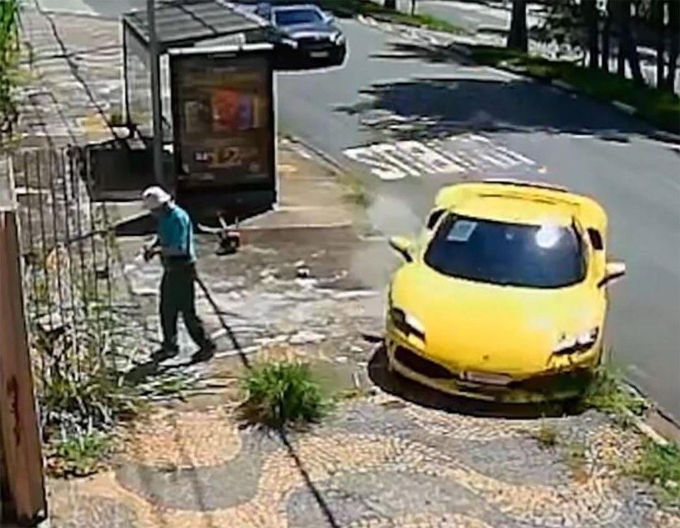 Yellow Ferrari crashing into a house.