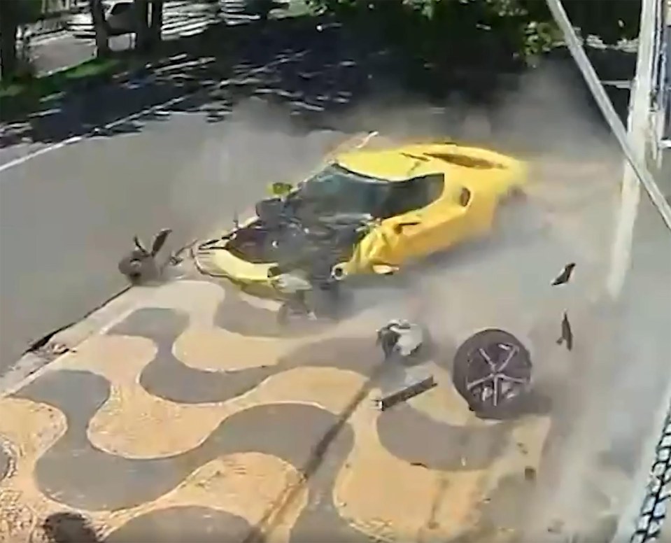 Yellow Ferrari crashing into a house.