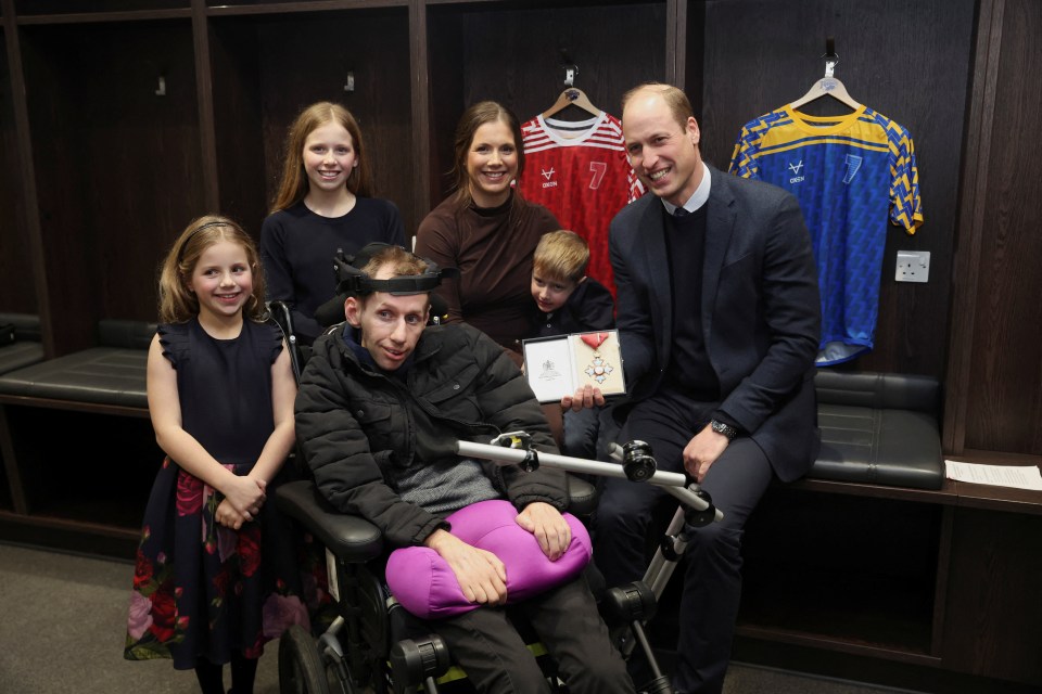 Prince William presenting an award to Rob Burrow.