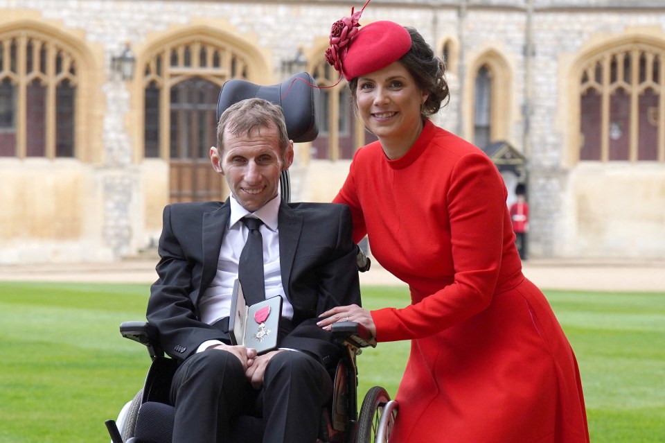 Rob Burrow and his wife Lindsey at an investiture ceremony, where he received an MBE.