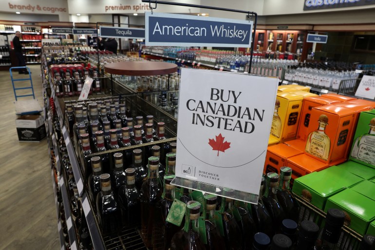 a sign says buy Canadian instead