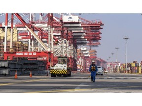 Gantry cranes at the Yangshan Deepwater Port in Shanghai. Photographer: Qilai Shen/Bloomberg