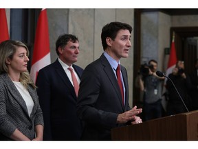 Justin Trudeau speaks at a press conference on Feb. 1.  Photographer: David Kawai/Bloomberg