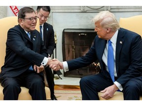 Shigeru ishiba and Donald Trump in the Oval Office on Feb. 7. Photographer: Anna Rose Layden/UPI/Bloomberg