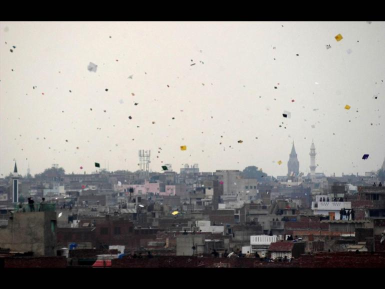 kites flying above the city