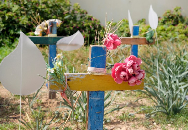 LAMPEDUSA (SICILY), ITALY - OCTOBER 20, 2019: In the cemetery of Lampedusa, Francesco Tuccio has placed some of his crosses where unnamed migrants drowned in the sea before arriving are buried photographed on October 20, 2019 in Lampedusa,Italy. Lampedusa the Southern most point of Italy stretching towards North Africa. For this reason it is one of the main destinations for migrants coming to Europe via boats. Carpenter Francesco Tuccio, with the wood obtained from boats abandoned or wrecked, builds crosses. He puts some of these crosses on the nameless graves of some unknown drowned migrants, in the cemetery of Lampedusa. 