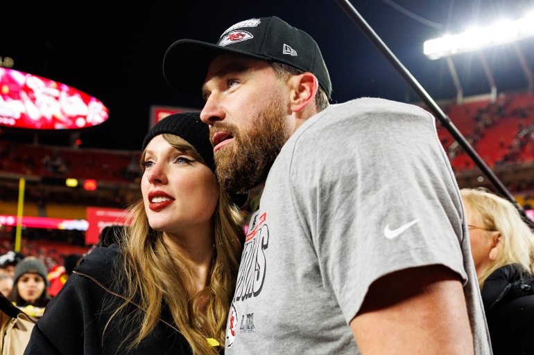 Travel Kelce and Taylor Swift embrace.