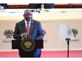 Cyril Ramaphosa delivers the State of the Nation address at the Cape Town City Hall on Feb. 6. Photographer: Rodger Bosch/AFP/Getty Images