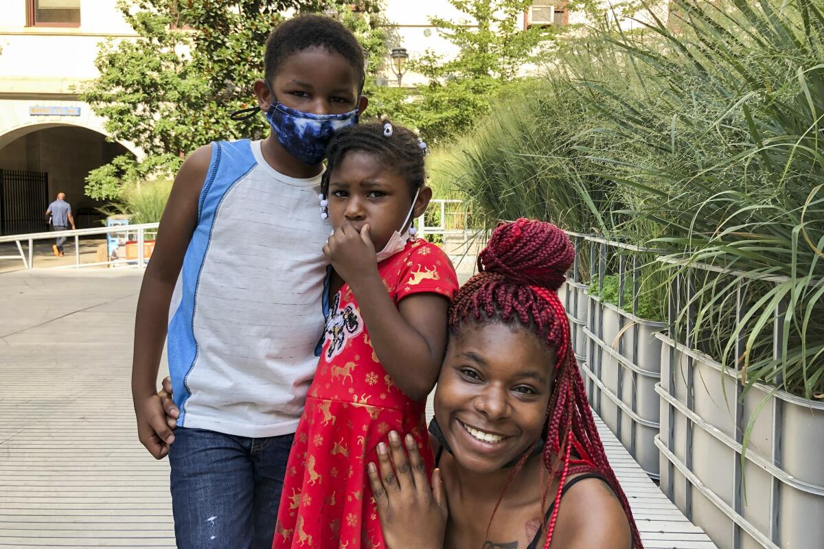 Erica Wilkins with children Kabir Grant, 6, and Nevaeh Grant, 4  