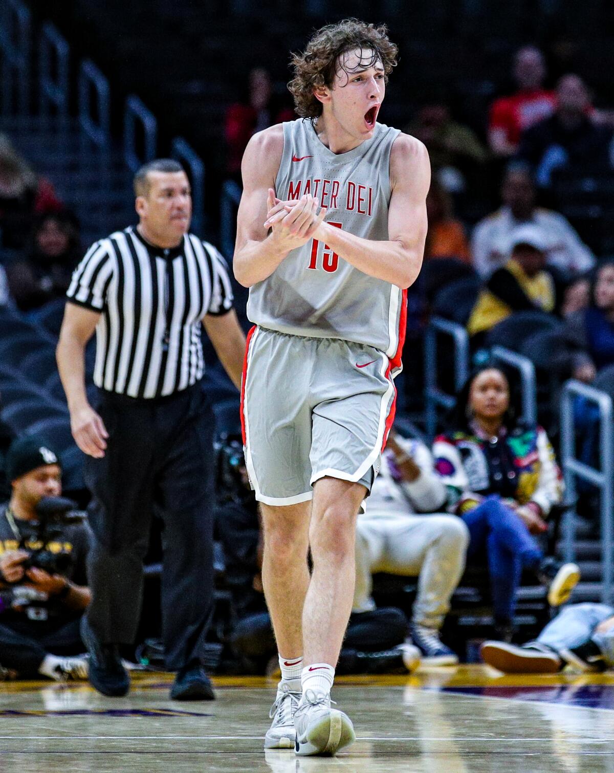 Mater Dei's Brannon Martinsen gets excited. He scored 19 points in win over St. John Bosco.