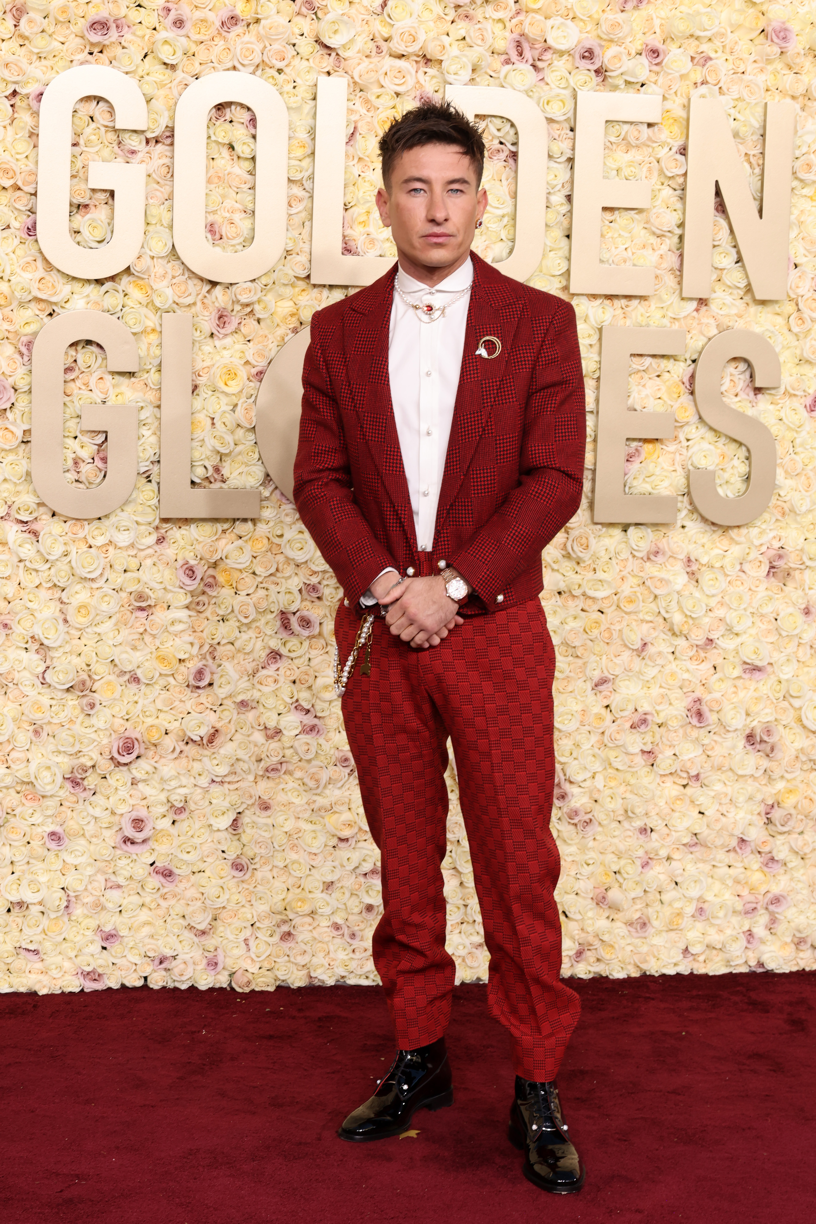 Barry Keoghan rocks a red suit on the red carpet