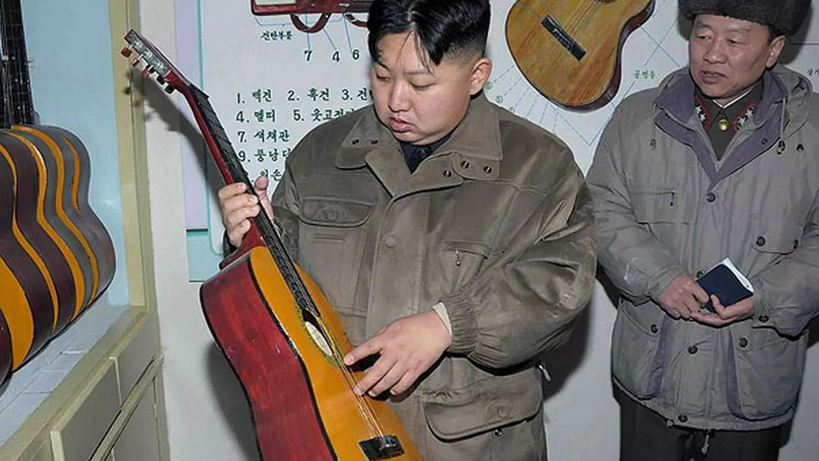 Kim is known to enjoy playing the guitar in his spare time