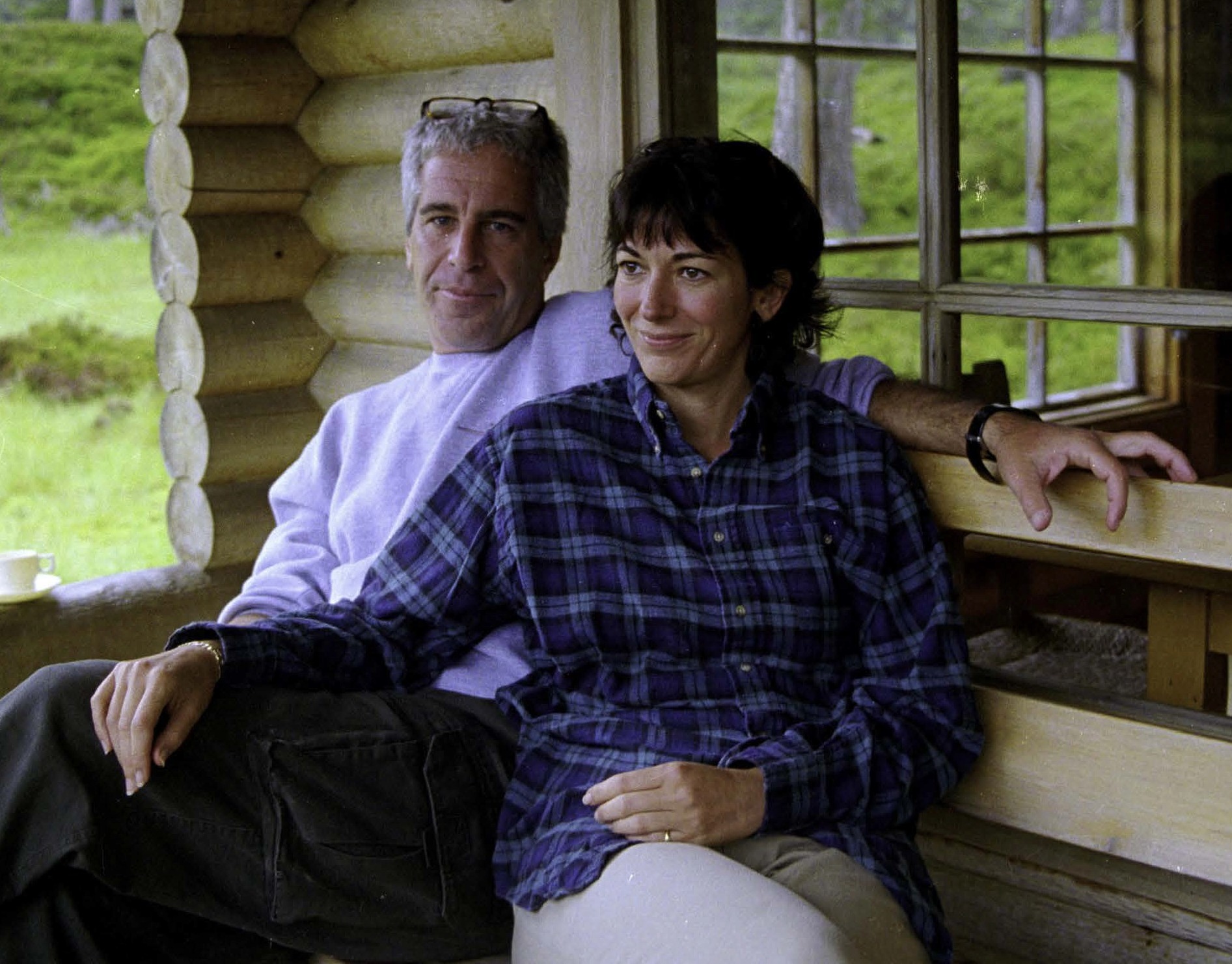 Ghislaine Maxwell and Jeffrey Epstein relax at The Queen's lodge at Balmoral