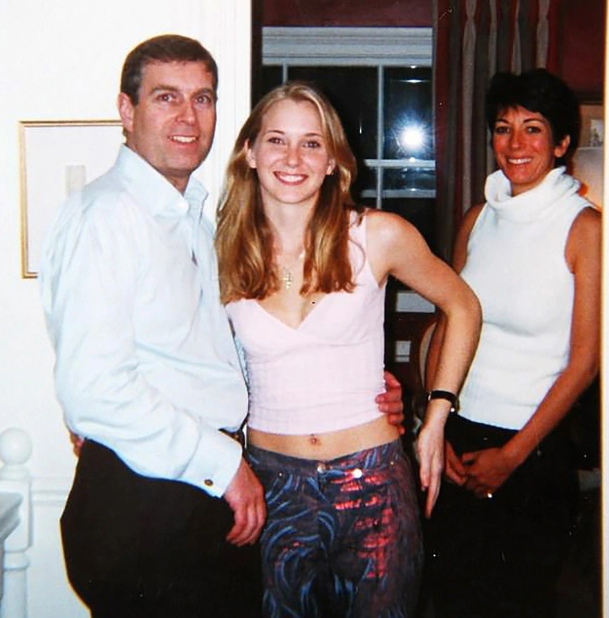 The notorious photo of Prince Andrew, Ghislaine Maxwell and Virginia Roberts taken in 2001