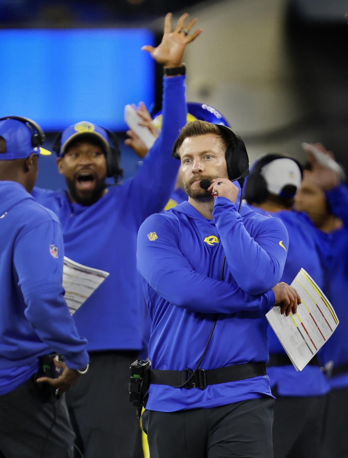 Rams head coach Sean McVay walks the sidelines during a game against the New Orleans Saints.