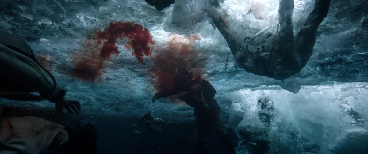 Aftermath of cannons hitting the lake and dropping soldiers into the icy water, as seen from below, in "Napoleon."