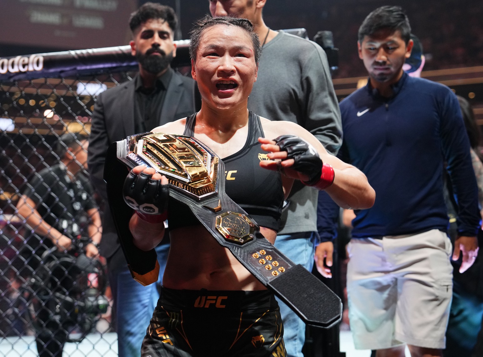 Strawweight queen Weili Zhang will defend her 115lbs title on the historic card