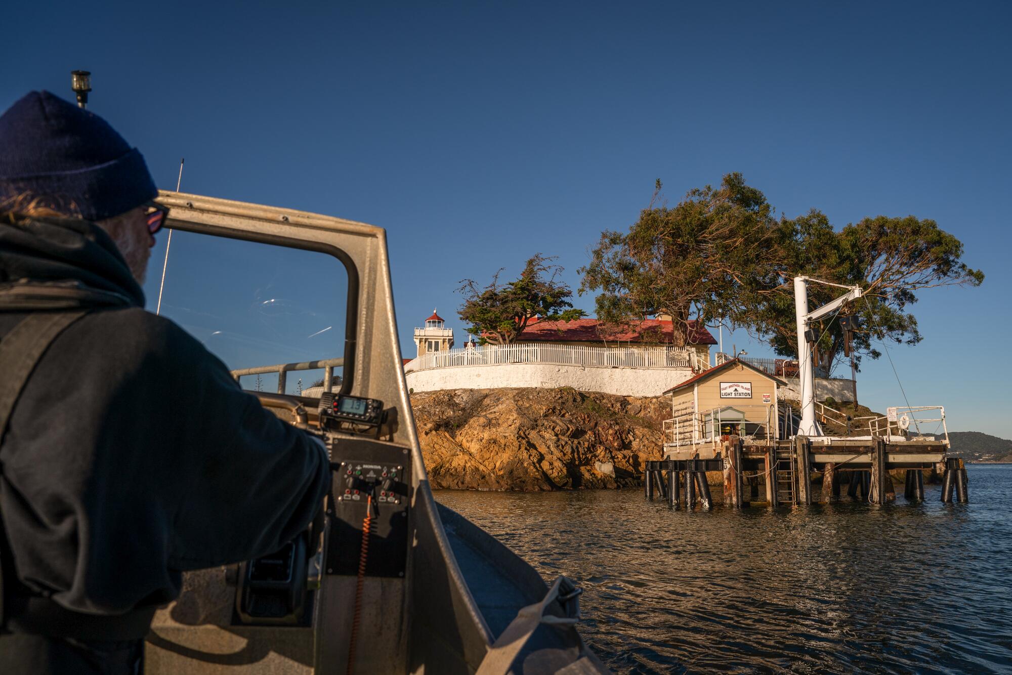 Innkeeper Dre Elmore captains the short boat trip.