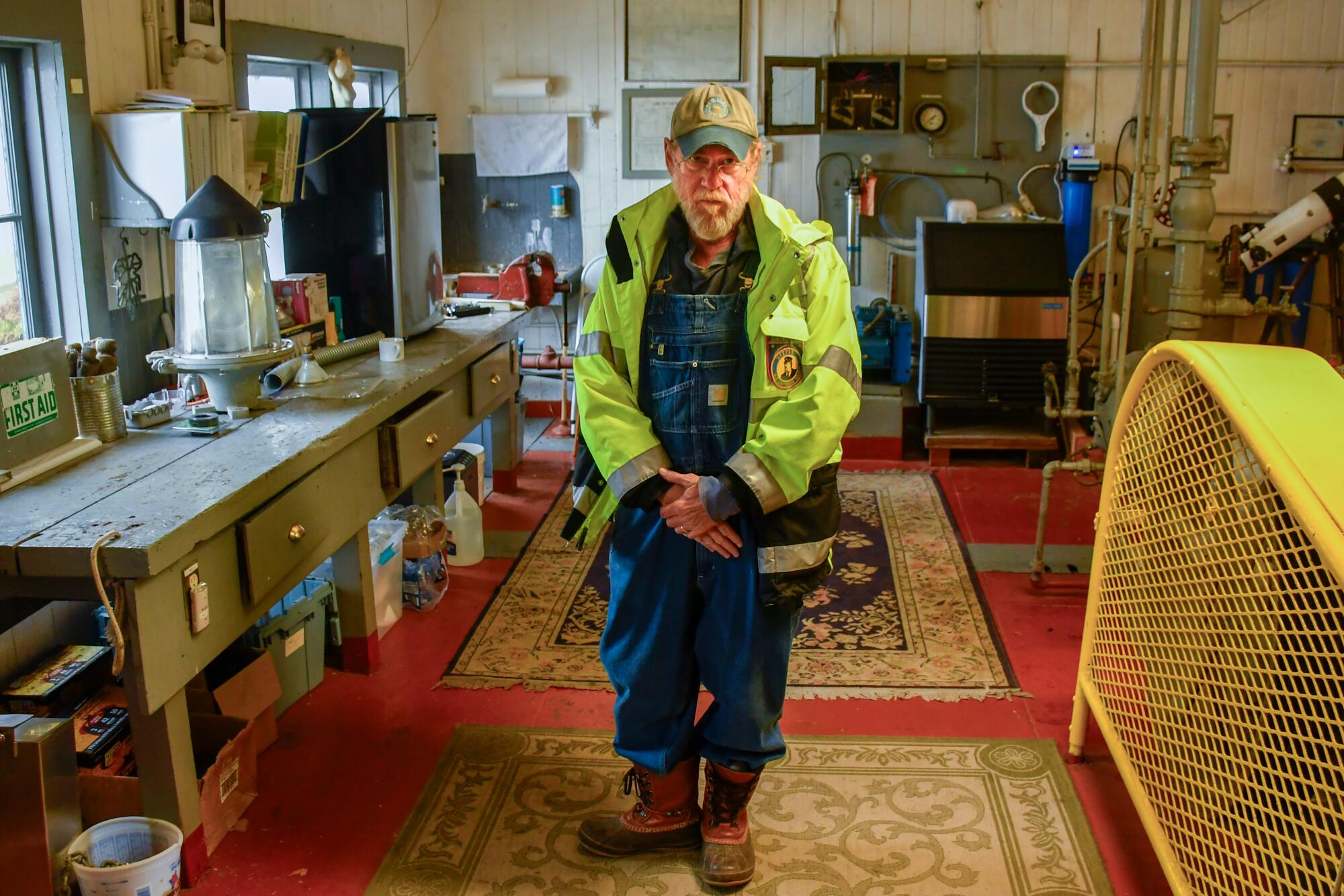 Innkeeper Dre Elmore prepares to demonstrate the vintage foghorn at the East Brother Light Station B&B.