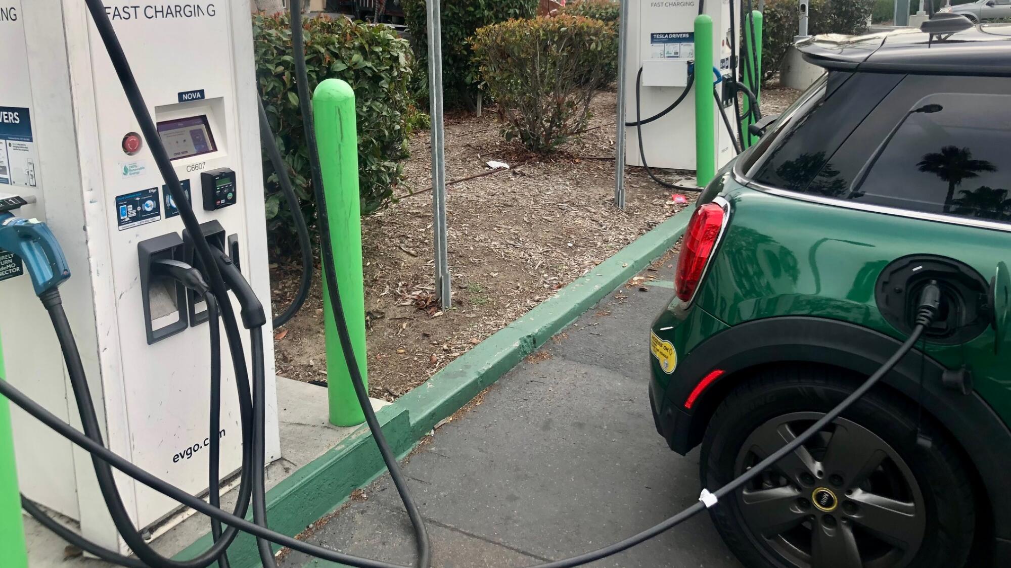 An electric vehicle charges its battery.