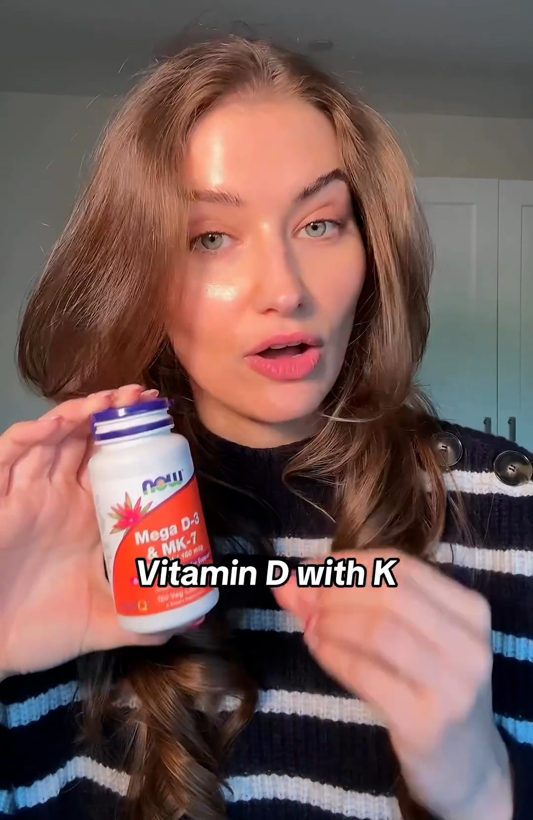 To promote growth of hair and nails, she took vitamin D supplements