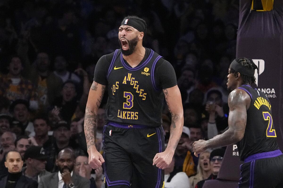 Lakers forward Anthony Davis celebrates after scoring during the Lakers' win over the Oklahoma City Thunder.