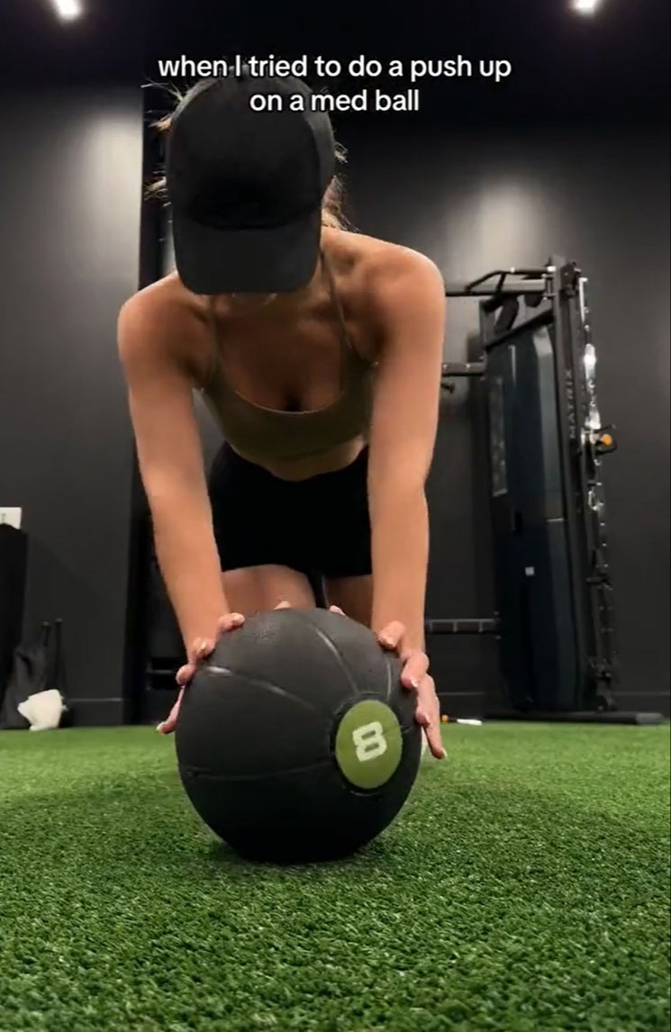 The influencer was confused about how to do a push-up on a med ball