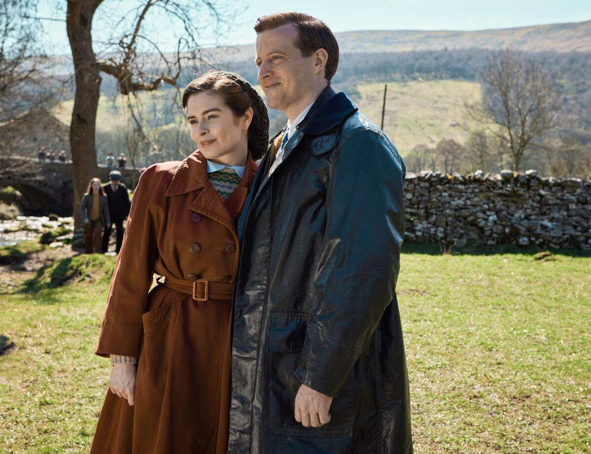 A couple in the World War II-era English countryside