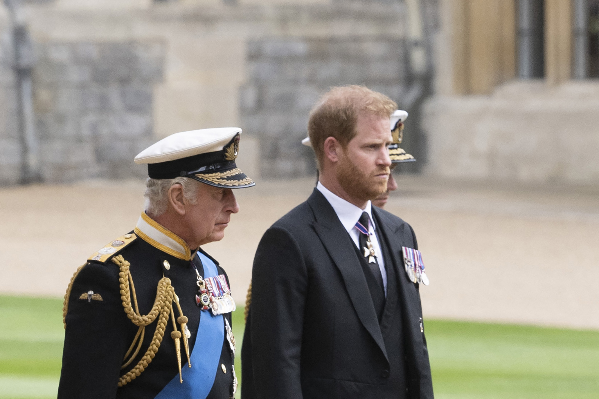 Harry with his father King Charles at the Queen's funeral in 2022