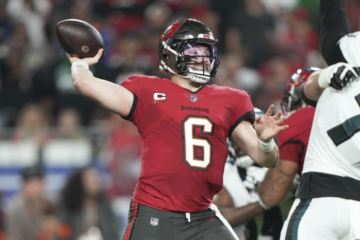 Tampa Bay Buccaneers quarterback Baker Mayfield passes during a wild-card playoff win.