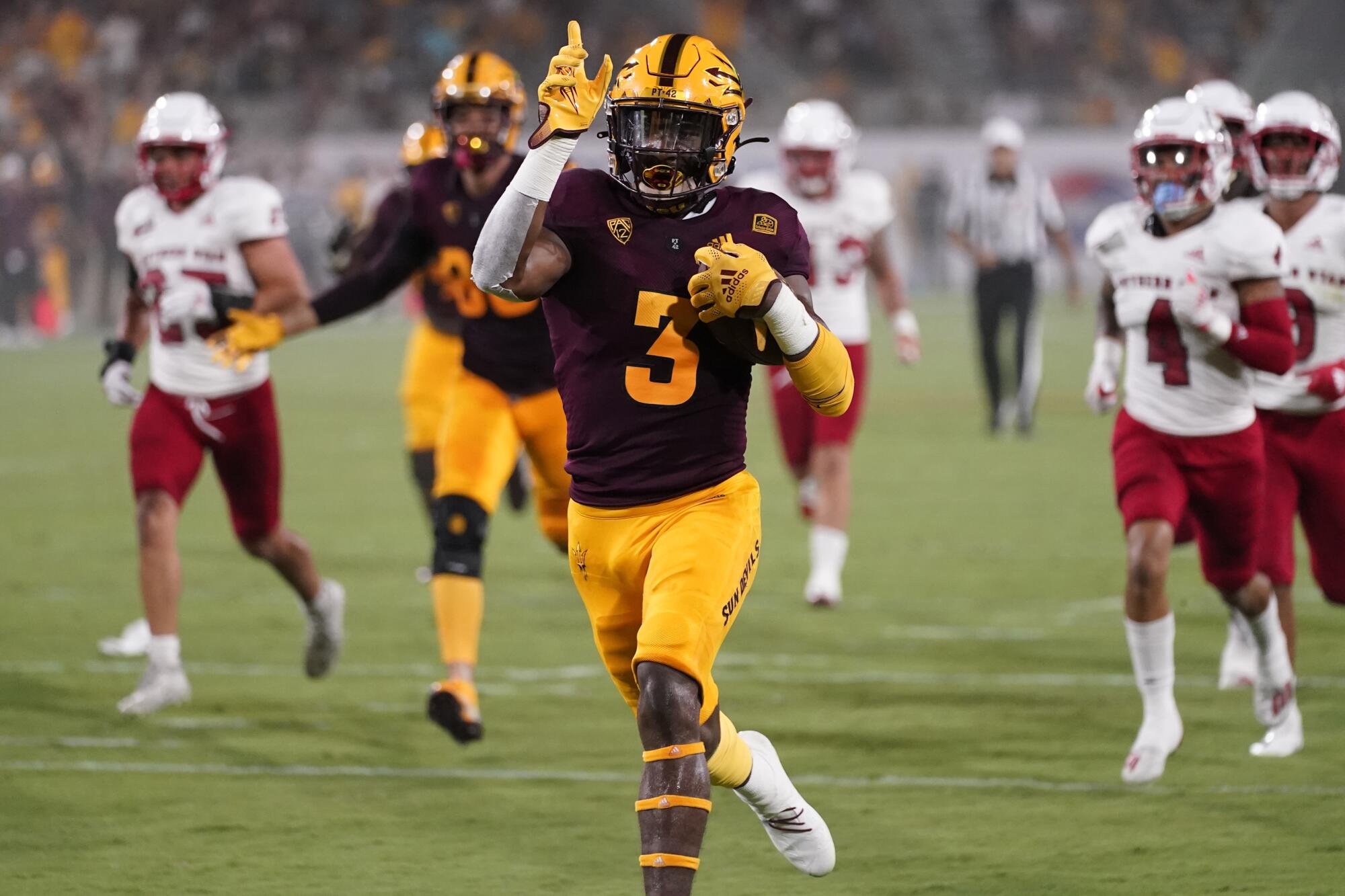 Arizona State running back Rachaad White scores a touchdown against Southern Utah in September 2021.