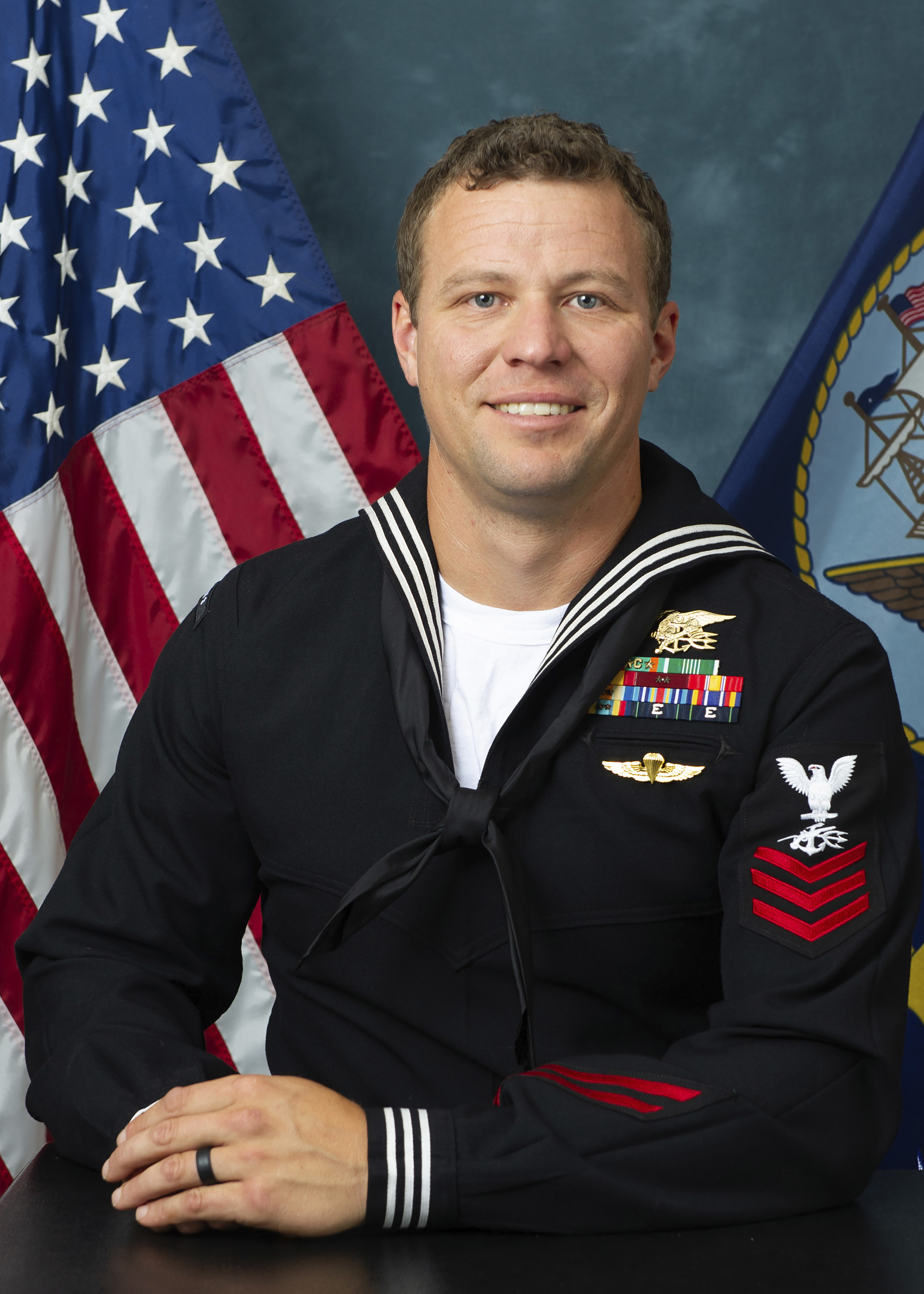 Navy Special Warfare Operator 1st Class Christopher J. Chambers jumped in to save Ingram but both men vanished into the sea