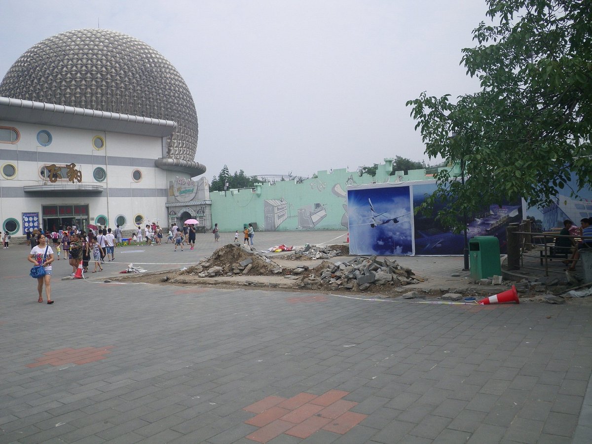 The park appears incomplete with torn-up floors and mountains of rubble