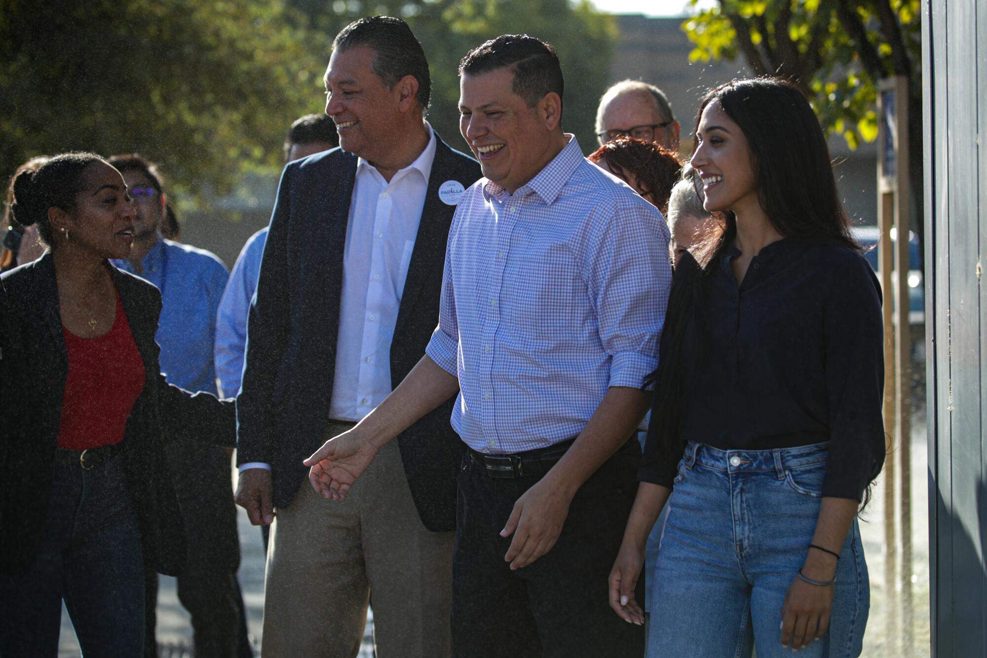 Senator Alex Padilla, second from left, campaigns for Assemblyman Rudy Salas.