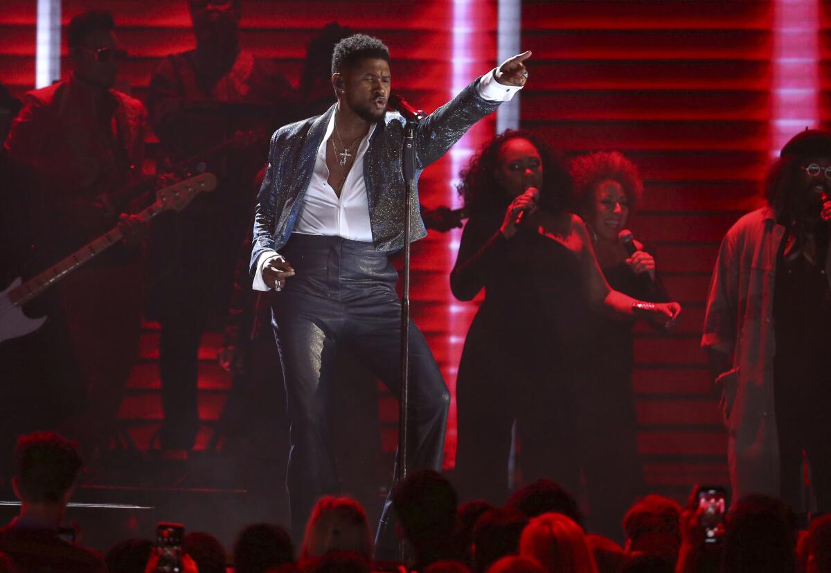 Usher performs during the 62nd Grammy Awards on Jan. 26, 2020.